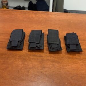 Four black molle pouches - fits flash light, magazine, OC, or TQ